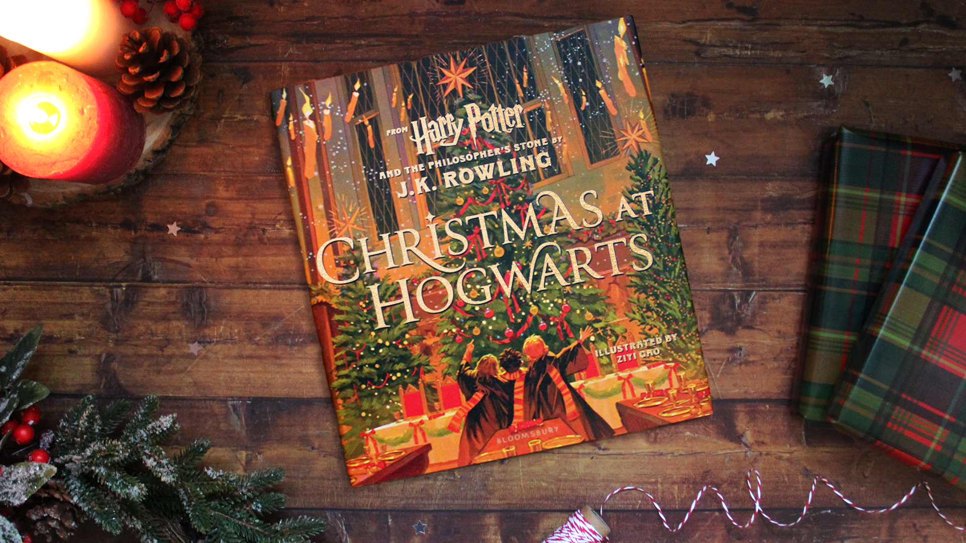 Book of Christmas at Hogwarts sitting on a wooden table